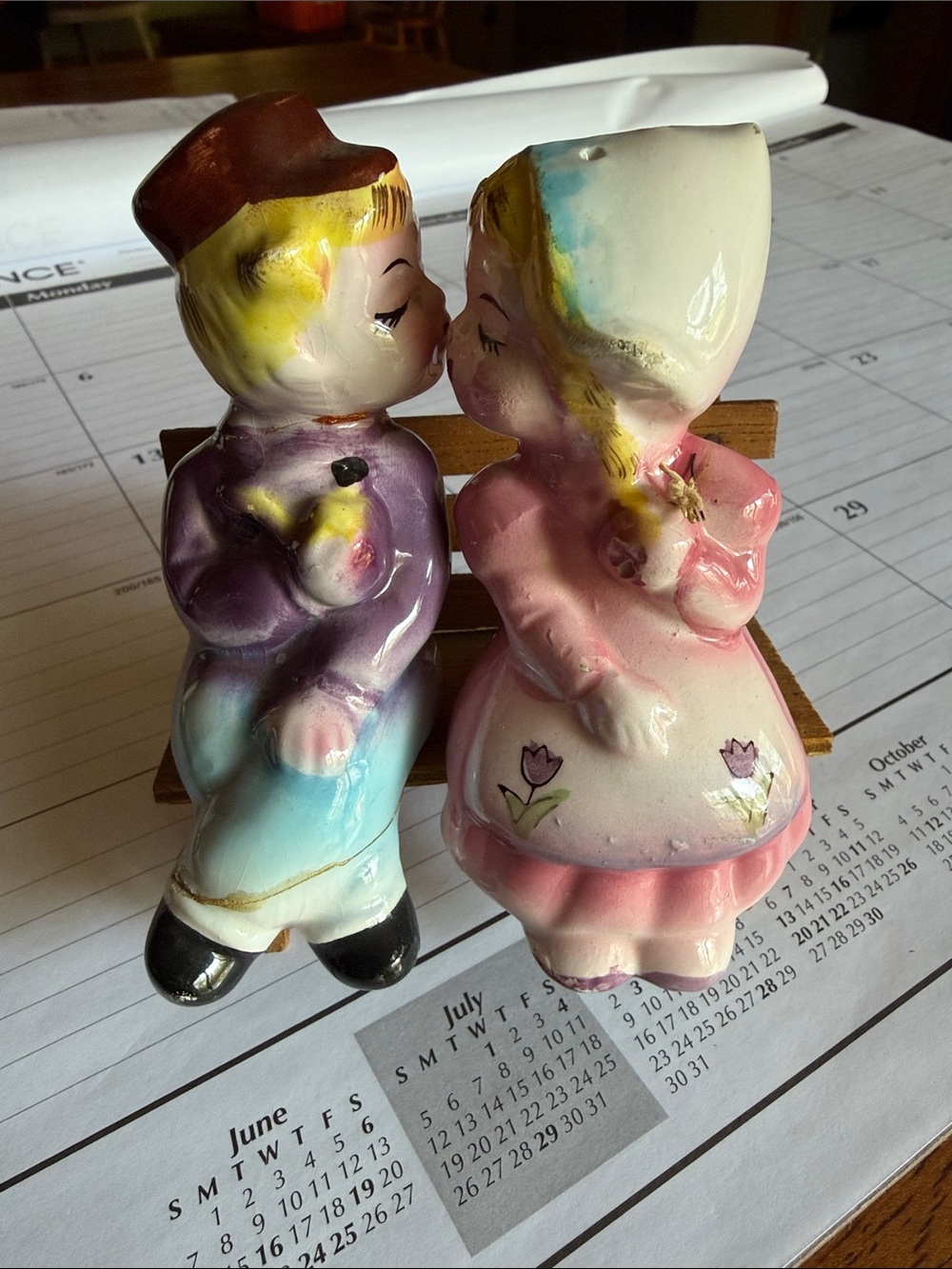 Vintage Ceramic Kissing Dutch Boy and Girl Figurines - salt and pepper shakers.